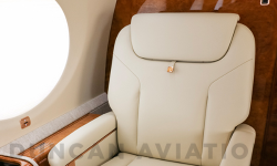 Cream leather captains chair in refurbished Gulfstream 650 by Duncan Aviation