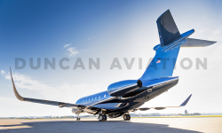 View from rear of Embraer EMB500 with new paint in shades of blue