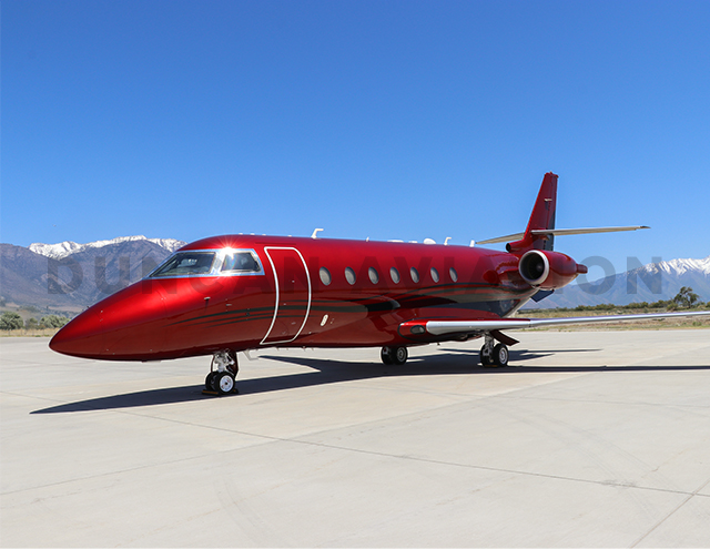 Exterior of Gulfstream G200 painted red by Duncan Aviation