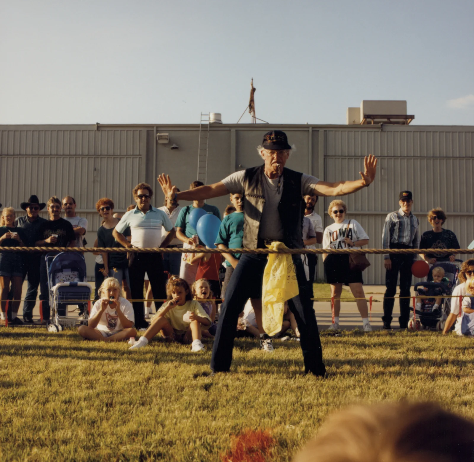 Robert Duncan refereeing a game of tug-of-war in 1994 at one of Duncan Aviation's many employee parties.