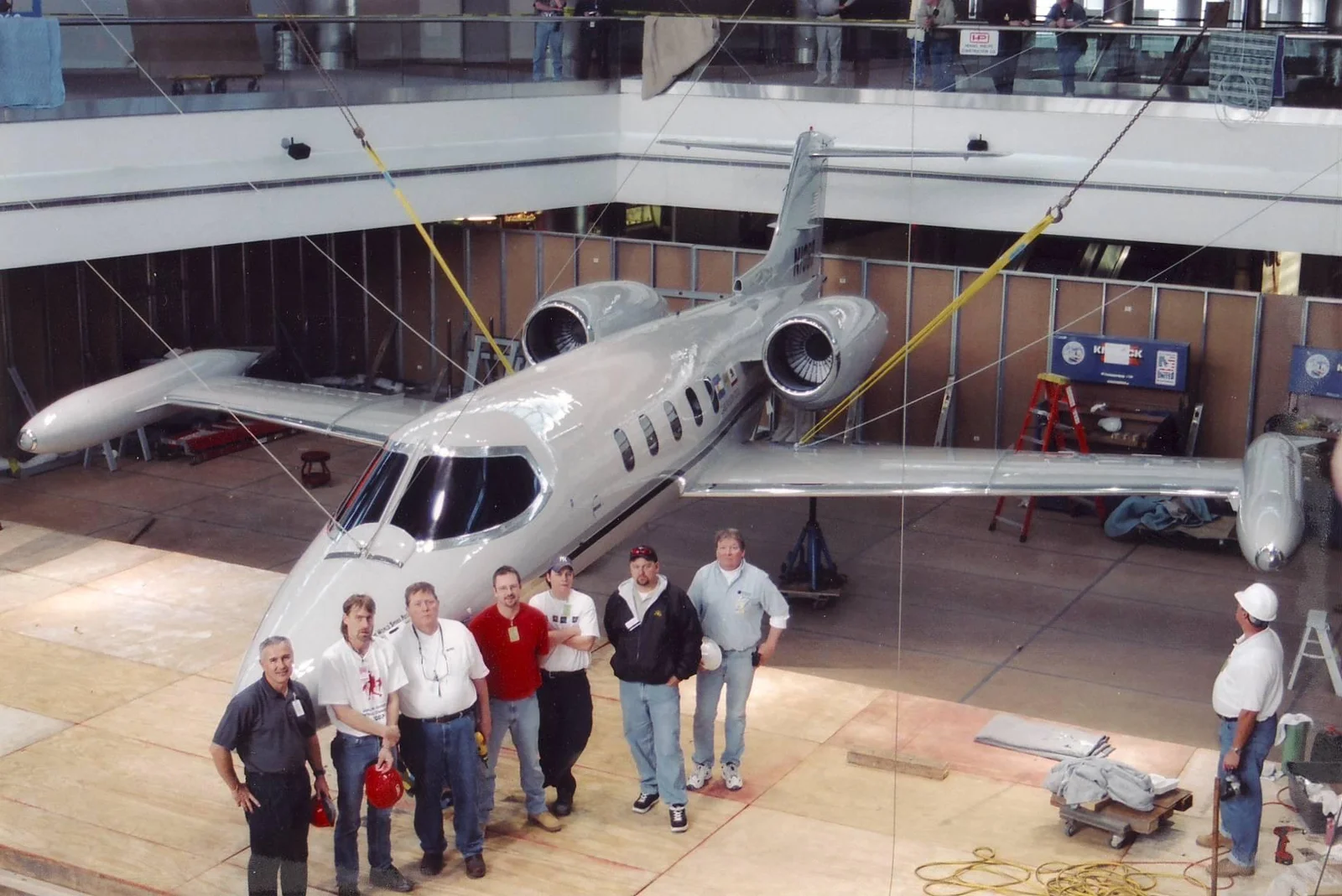 A team from Duncan Aviation helped install a Learjet suspended from the ceiling in Denver International Airport&rsquo;s Concourse C in 2002.