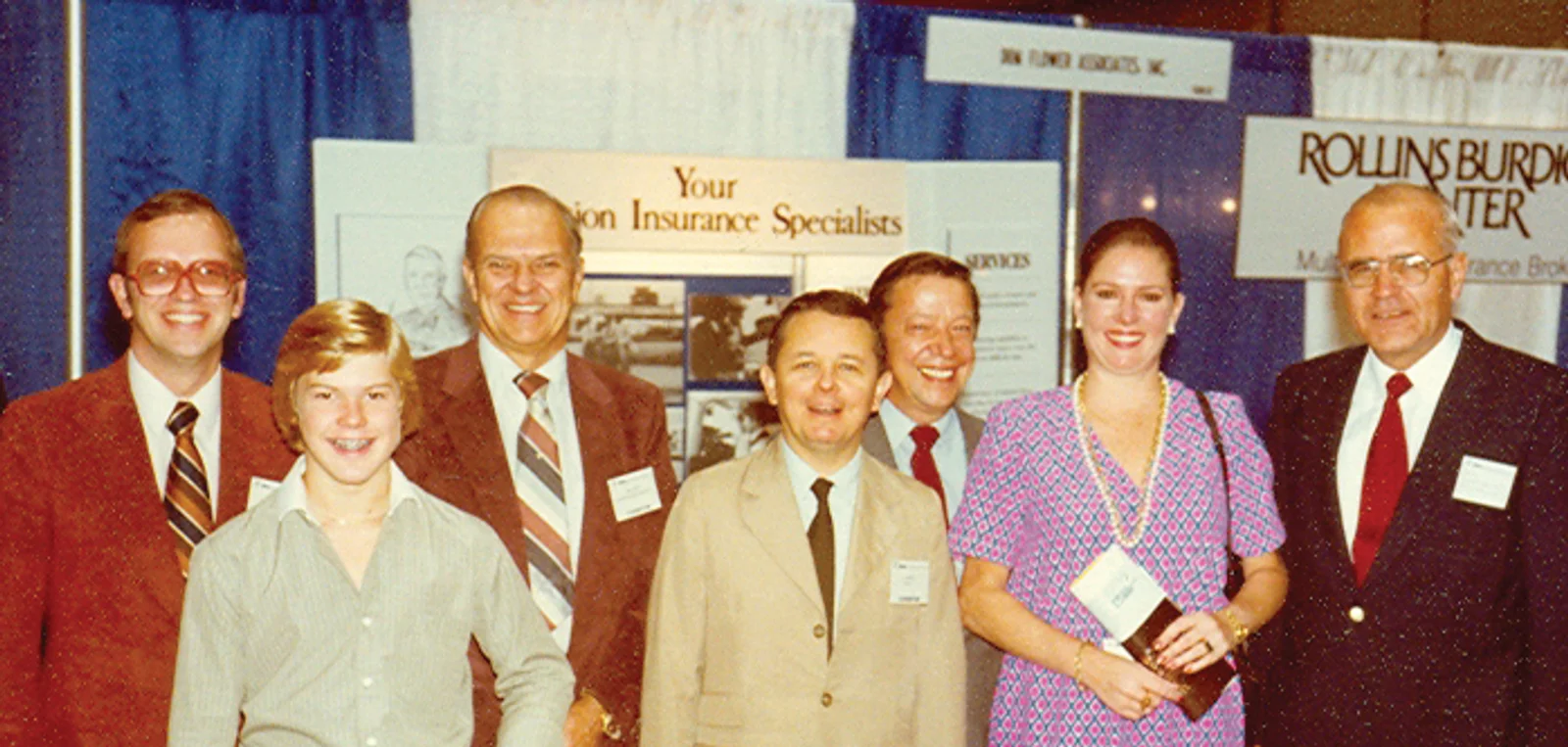 Robert, Todd and Donald Duncan join Alec Couvelaire at a tradeshow in the late 1970s.